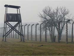 photo of a guard tower at a concentration camp